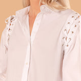 CAMISA OJILLOS