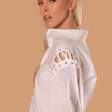 CAMISA OJILLOS