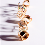 Anillo Dorado Doble Zirconia Azul y Negro